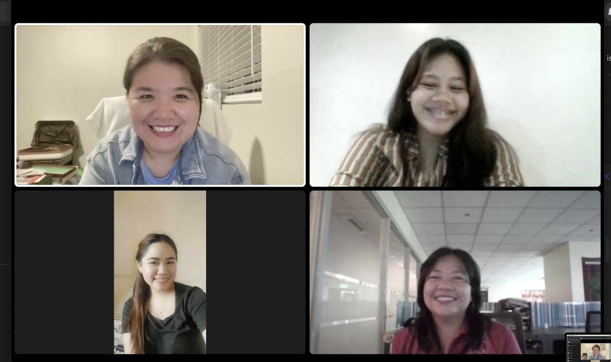 Arlene and Usella meeting virtually with their team